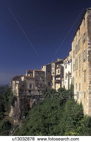 Stock Photo -  France, Tourrettes-sur-Loup, Cote d' Azur, Provence, Alpes-Maritimes, Europe, Scenic view of the hilltop village of Tourrettes-s-Loup in the Provencal countryside of France.. Fotosearch
