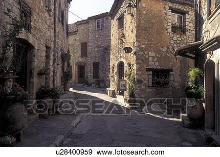 France, Tourrettes-sur-Loup, Cote d' Azur, Provence, Alpes-Maritimes, Europe, Buildings along the narrow streets of the hilltop village of Tourrettes-s-Loup. View Large Photo Image Stock Photo - France, Tourrettes-sur-Loup, Cote d' Azur, Provence, Alpes-Maritimes, Europe, Buildings along the narrow streets of the hilltop village of Tourrettes-s-Loup.. Fotosearch