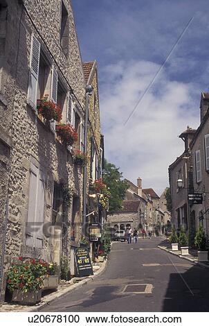 France, Vezelay, Burgundy, Yonne, wine region, Bourgogne, Europe, Shops along a narrow street in Vezelay in the wine region of Burgundy. View Large Photo Image Stock Image - France, Vezelay, Burgundy, Yonne, wine region, Bourgogne, Europe, Shops along a narrow street in Vezelay in the wine region of Burgundy.. Fotosearch