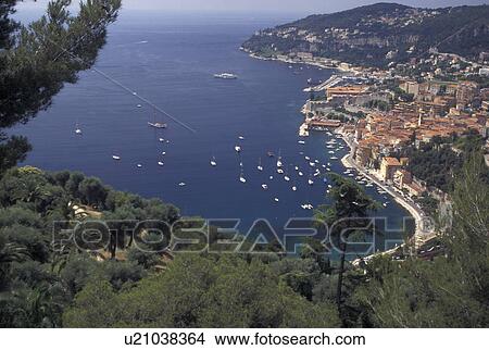 Picture -  France, Villefranche-sur-Mer, Cote d' Azur, Provence, Alpes-Maritimes, Europe, Aerial view of the city of Villefranche-s-Mer along the Mediterranean Sea.. Fotosearch