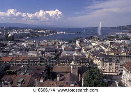 Geneva, Switzerland, Aerial view of the city of Geneva and Lake Geneva with the Jet d' Eau from St. Peter's cathedral (cathedrale St. Pierre) View Large Photo Image Picture - Geneva, Switzerland, Aerial view of the city of Geneva and Lake Geneva with the Jet d' Eau from St. Peter's cathedral (cathedrale St. Pierre) . Fotosearch
