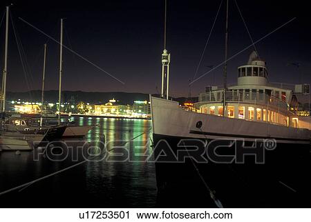 Geneva, Switzerland, Lake Geneva, Paddlewheel sightseeing boat docked at the marina at night in the harbor of Lac Leman in Geneva. View Large Photo Image Stock Image - Geneva, Switzerland, Lake Geneva, Paddlewheel sightseeing boat docked at the marina at night in the harbor of Lac Leman in Geneva.. Fotosearch
