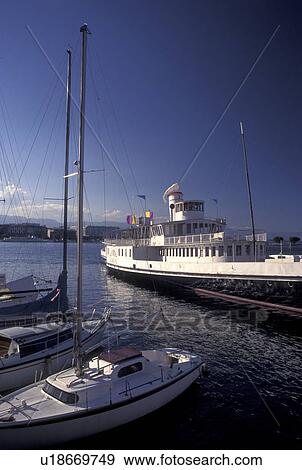 Geneva, Switzerland, Lake Geneva, Paddlewheel sightseeing boat docked at the marina in the harbor of Lac Leman in Geneva. View Large Photo Image Stock Photo - Geneva, Switzerland, Lake Geneva, Paddlewheel sightseeing boat docked at the marina in the harbor of Lac Leman in Geneva.. Fotosearch