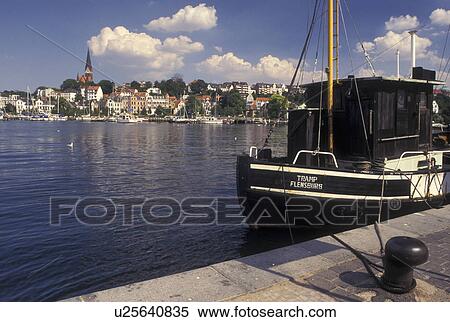 Germany, Flensburg, Schleswig-Holstein, Baltic Sea, Europe, Boat docked in the harbor of Flensburg Gate to the North. View Large Photo Image Stock Photography - Germany, Flensburg, Schleswig-Holstein, Baltic Sea, Europe, Boat docked in the harbor of Flensburg Gate to the North.. Fotosearch