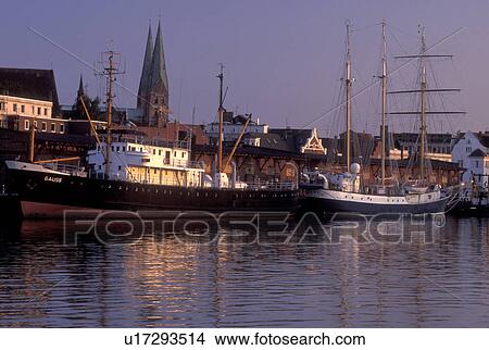 Germany, Lubeck, Schleswig-Holstein, Baltic Sea, Europe, Boats docked in the Hansahafen (harbor). View Large Photo Image Picture - Germany, Lubeck, Schleswig-Holstein, Baltic Sea, Europe, Boats docked in the Hansahafen (harbor).. Fotosearch