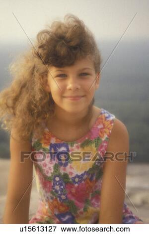 girl, Atlanta, GA, Georgia, 8 year old girl with flowered dress sitting on Stone Mountain in Atlanta. View Large Photo Image Stock Photo - girl, Atlanta, GA, Georgia, 8 year old girl with flowered dress sitting on Stone Mountain in Atlanta.. Fotosearch