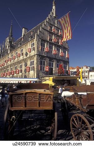 Gouda, Holland, Netherlands, Zuid-Holland, Europe, Cheese wagons outside Town Hall on Cheese Market Day in downtown Gouda. View Large Photo Image Stock Photo - Gouda, Holland, Netherlands, Zuid-Holland, Europe, Cheese wagons outside Town Hall on Cheese Market Day in downtown Gouda.. Fotosearch