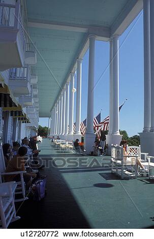 Grand Hotel, Mackinac Island, MI, Lake Huron, Michigan, Hotel guests sitting on the veranda of Historic Grand Hotel on Mackinac Island. View Large Photo Image Stock Image - Grand Hotel, Mackinac Island, MI, Lake Huron, Michigan, Hotel guests sitting on the veranda of Historic Grand Hotel on Mackinac Island.. Fotosearch