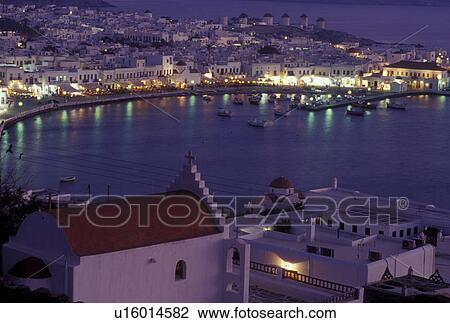 Greece, Mykonos, Greek Islands, Cyclades, Europe, Scenic view of Mykonos Harbor in the evening on the Aegean Sea. View Large Photo Image Stock Image - Greece, Mykonos, Greek Islands, Cyclades, Europe, Scenic view of Mykonos Harbor in the evening on the Aegean Sea.. Fotosearch
