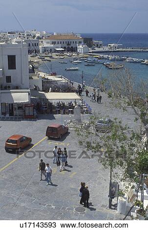 Greece, Mykonos, Greek Islands, Cyclades, Europe, Scenic view of Mykonos Harbor and the waterfront on the Aegean Sea. View Large Photo Image Stock Image - Greece, Mykonos, Greek Islands, Cyclades, Europe, Scenic view of Mykonos Harbor and the waterfront on the Aegean Sea.. Fotosearch
