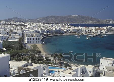 Stock Photo -  Greece, Mykonos, Greek Islands, Cyclades, Europe, Scenic view of Mykonos Harbor on the Aegean Sea.. Fotosearch