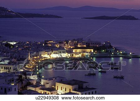 Greece, Mykonos, Greek Islands, Cyclades, Greece, Europe, Scenic view of Mykonos Harbor in the evening on the Aegean Sea. View Large Photo Image Stock Photo - Greece, Mykonos, Greek Islands, Cyclades, Greece, Europe, Scenic view of Mykonos Harbor in the evening on the Aegean Sea.. Fotosearch
