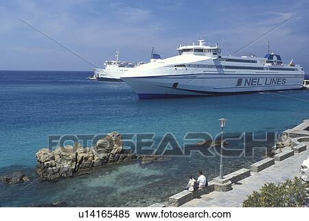 Greece, Mykonos, Greek Islands, Cyclades, Europe, Ferries docked in the harbor on Mykonos Island on the Aegean Sea. View Large Photo Image Stock Photography - Greece, Mykonos, Greek Islands, Cyclades, Europe, Ferries docked in the harbor on Mykonos Island on the Aegean Sea.. Fotosearch