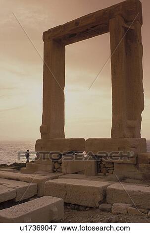 Greece, Naxos, Greek Islands, Cyclades, Europe, Temple of Apollo on Naxos Island at sunset on the Aegean Sea. View Large Photo Image Stock Photo - Greece, Naxos, Greek Islands, Cyclades, Europe, Temple of Apollo on Naxos Island at sunset on the Aegean Sea.. Fotosearch