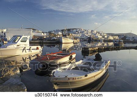 Greece, Paros, Greek Islands, Naoussa, Cyclades, Europe, Fishing boats docked in Naoussa Harbor on Paros Island on the Aegean Sea. View Large Photo Image Picture - Greece, Paros, Greek Islands, Naoussa, Cyclades, Europe, Fishing boats docked in Naoussa Harbor on Paros Island on the Aegean Sea.. Fotosearch