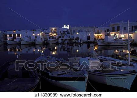 Greece, Paros, Greek Islands, Naoussa, Cyclades, Europe, Fishing boats docked in Naoussa Harbor in the evening on Paros Island on the Aegean Sea. View Large Photo Image Stock Photo - Greece, Paros, Greek Islands, Naoussa, Cyclades, Europe, Fishing boats docked in Naoussa Harbor in the evening on Paros Island on the Aegean Sea.. Fotosearch
