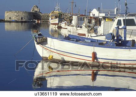 Greece, Paros, Greek Islands, Naoussa, Cyclades, Europe, Fishing boats docked in Naoussa Harbor on Paros Island on the Aegean Sea. View Large Photo Image Stock Photo - Greece, Paros, Greek Islands, Naoussa, Cyclades, Europe, Fishing boats docked in Naoussa Harbor on Paros Island on the Aegean Sea.. Fotosearch