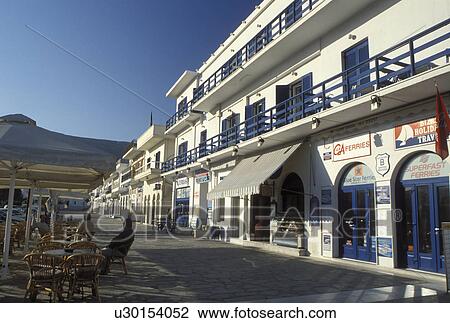 Greece, Paros, Greek Islands, Parikia, Cyclades, Europe, Outdoor cafT and shops along the waterfront in the town of Parikia on Paros Island. View Large Photo Image Stock Image - Greece, Paros, Greek Islands, Parikia, Cyclades, Europe, Outdoor cafT and shops along the waterfront in the town of Parikia on Paros Island.. Fotosearch