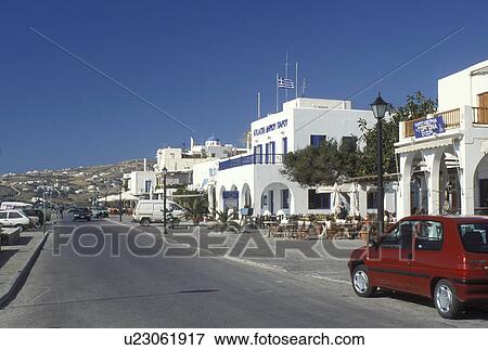 Greece, Paros, Greek Islands, Parikia, Cyclades, Europe, Stores and cafTs along the waterfront in the harbor of Parikia on Paros Island on the Aegean Sea. View Large Photo Image Stock Photo - Greece, Paros, Greek Islands, Parikia, Cyclades, Europe, Stores and cafTs along the waterfront in the harbor of Parikia on Paros Island on the Aegean Sea.. Fotosearch