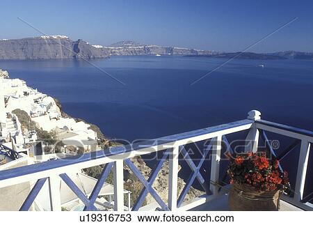 Stock Image -  Greece, Santorini, Greek Islands, Oia, Cyclades, Europe, Scenic view of the Aegean Sea from the village of Oia on Santorini Island.. Fotosearch