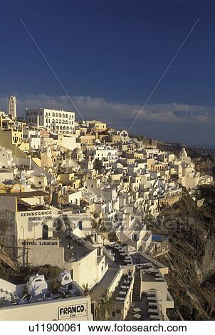 Greece, Santorini, Greek Islands, Fira, Cyclades, Europe, Whitewashed buildings in the village of Fira on the steep hillside of Santorini Island on the Aegean Sea. View Large Photo Image Stock Image - Greece, Santorini, Greek Islands, Fira, Cyclades, Europe, Whitewashed buildings in the village of Fira on the steep hillside of Santorini Island on the Aegean Sea.. Fotosearch