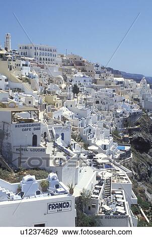 Greece, Santorini, Greek Islands, Fira, Cyclades, Europe, Whitewashed buildings in the village of Fira on the steep hillside of Santorini Island on the Aegean Sea. View Large Photo Image Stock Photo - Greece, Santorini, Greek Islands, Fira, Cyclades, Europe, Whitewashed buildings in the village of Fira on the steep hillside of Santorini Island on the Aegean Sea.. Fotosearch