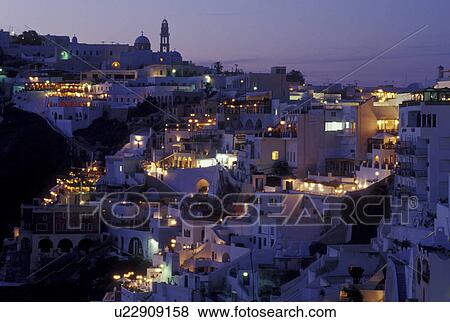 Greece, Santorini, Greek Islands, Fira, Cyclades, Europe, Village of Fira at night on the steep hillside of Santorini Island on the Aegean Sea. View Large Photo Image Stock Photo - Greece, Santorini, Greek Islands, Fira, Cyclades, Europe, Village of Fira at night on the steep hillside of Santorini Island on the Aegean Sea.. Fotosearch