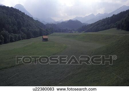Gruyeres, Switzerland, Fribourg, Scenic view of valley and mountains of Gruyeres in the Canton of Fribourg. View Large Photo Image Stock Image - Gruyeres, Switzerland, Fribourg, Scenic view of valley and mountains of Gruyeres in the Canton of Fribourg.. Fotosearch