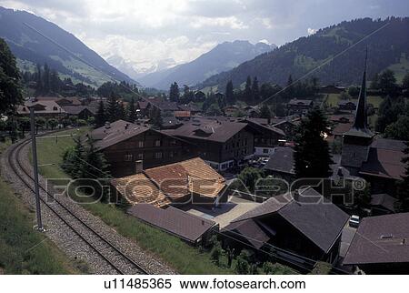 Gstaad, Switzerland, Berne, Bern, View of the resort town of Gstaad in the Bernese Oberland. View Large Photo Image Stock Photography - Gstaad, Switzerland, Berne, Bern, View of the resort town of Gstaad in the Bernese Oberland.. Fotosearch