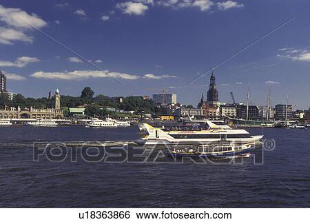 Stock Photograph -  Hamburg, Germany, Elbe River, North Sea, Europe, View of excursion boats cruising in Hamburg and St. Pauli's Harbor.. Fotosearch