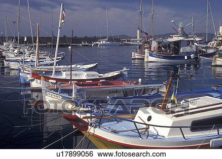 harbor, France, St. Raphael, Cote d' Azur, Provence, Var, Europe, Colorful fishing boats docked at the marina in the harbor of Saint Raphael on the Mediterranean Sea. View Large Photo Image Stock Photograph - harbor, France, St. Raphael, Cote d' Azur, Provence, Var, Europe, Colorful fishing boats docked at the marina in the harbor of Saint Raphael on the Mediterranean Sea.. Fotosearch