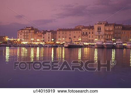 harbor, sunset, St. Tropez, France, Cote d' Azur, Provence, Var, Europe, Yachts docked in the harbor of Saint Tropez at sunset on the Mediterranean Sea. View Large Photo Image Stock Photo - harbor, sunset, St. Tropez, France, Cote d' Azur, Provence, Var, Europe, Yachts docked in the harbor of Saint Tropez at sunset on the Mediterranean Sea.. Fotosearch