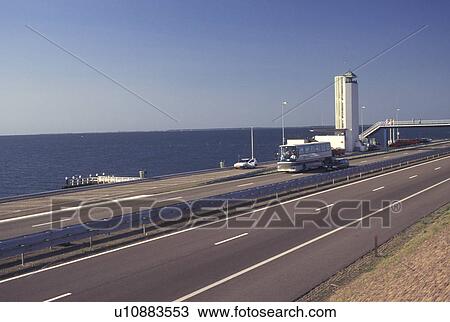 Holland, dike, Netherlands, Europe, North Sea, Noordzee, Nordsee, Waddenzee, Visitor Center along the 30-km long Afsluitdijk or Barrier Dyke along IJsselmeer Lake connects the provinces of Noord-Holland (North Holland) and Friesland View Large Photo Image Stock Image - Holland, dike, Netherlands, Europe, North Sea, Noordzee, Nordsee, Waddenzee, Visitor Center along the 30-km long Afsluitdijk or Barrier Dyke along IJsselmeer Lake connects the provinces of Noord-Holland (North Holland) and Friesland. Fotosearch