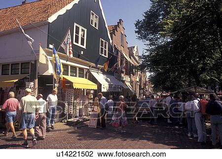 Holland, Edam, Netherlands, Noord-Holland, Europe, Shops along a pedestrian street in the city of Edam. View Large Photo Image Stock Image - Holland, Edam, Netherlands, Noord-Holland, Europe, Shops along a pedestrian street in the city of Edam.. Fotosearch