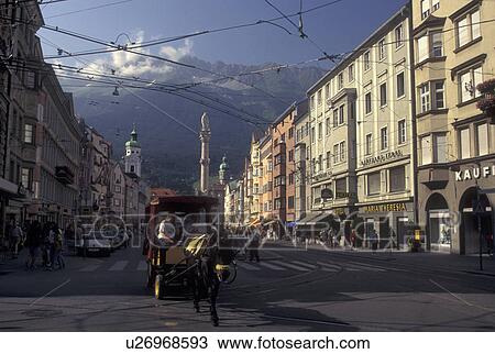horse drawn carriage, Innsbruck, Austria, Tirol, Alps, Carriage tour through downtown Innsbruck with view of the Alps. View Large Photo Image Stock Image - horse drawn carriage, Innsbruck, Austria, Tirol, Alps, Carriage tour through downtown Innsbruck with view of the Alps.. Fotosearch