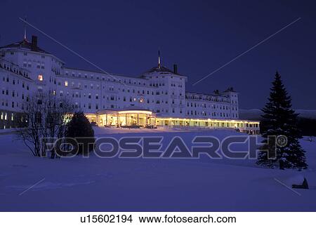 Picture -  hotel, Bretton Woods, NH, New Hampshire, Historic Mount Washington Hotel & Resort in the evening in the winter in Bretton Woods.. Fotosearch