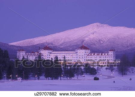 hotel, Bretton Woods, NH, New Hampshire, Scenic view of Historic Mount Washington Hotel & Resort and Mt. Washington in winter in the White Mountains National Forest in the evening. View Large Photo Image Stock Image - hotel, Bretton Woods, NH, New Hampshire, Scenic view of Historic Mount Washington Hotel & Resort and Mt. Washington in winter in the White Mountains National Forest in the evening.. Fotosearch