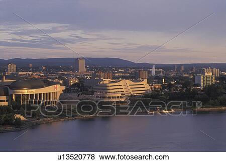 Stock Photo -  Hull, Canada, Quebec, Aerial view of the city of Hull along the Ottawa River.. Fotosearch