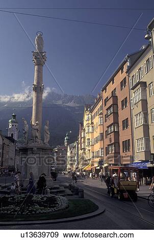 Stock Photo -  Innsbruck, Austria, Tirol, Alps, Carriage tour through downtown Innsbruck with view of the Alps.. Fotosearch
