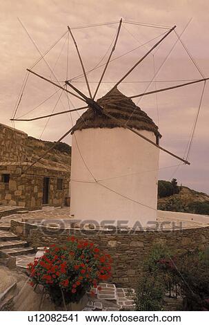Stock Image -  Ios, Greek Islands, Cyclades, Hora, Greece, Europe, Windmill in the village of Hora on Ios Island on the Aegean Sea.. Fotosearch