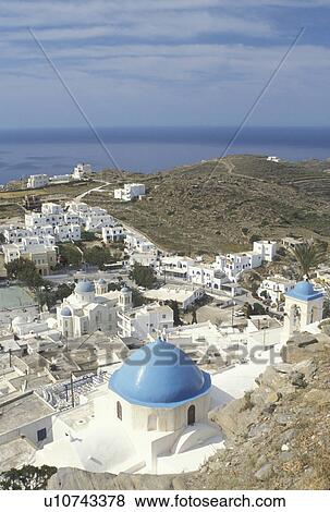 Stock Photo -  Ios, Greek Islands, Cyclades, Ormos, Greece, Europe, Scenic view of Hora on Ios Island on the Aegean Sea.. Fotosearch