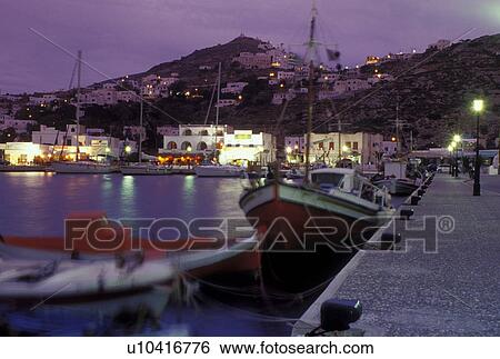 Ios, Greek Islands, Ormos, Cyclades, Greece, Europe, Fishing boats docked in the harbor of Ormos on Ios Island in the evening on the Aegean Sea. View Large Photo Image Stock Photograph - Ios, Greek Islands, Ormos, Cyclades, Greece, Europe, Fishing boats docked in the harbor of Ormos on Ios Island in the evening on the Aegean Sea.. Fotosearch