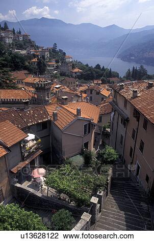 Italy, Moltrasio, Lombardy, Lombardia, Lake Como, Southern Alps, Scenic view of Lake Como from the rooftops of the village of Moltrasio. View Large Photo Image Stock Image - Italy, Moltrasio, Lombardy, Lombardia, Lake Como, Southern Alps, Scenic view of Lake Como from the rooftops of the village of Moltrasio.. Fotosearch