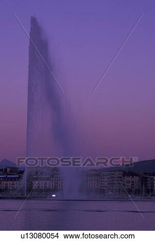 Jet d' Eau, Geneva, Switzerland, Lake Geneva, Jet d' Eau on the waterfront of Lac Leman in Geneva at sunset. View Large Photo Image Picture - Jet d' Eau, Geneva, Switzerland, Lake Geneva, Jet d' Eau on the waterfront of Lac Leman in Geneva at sunset. . Fotosearch