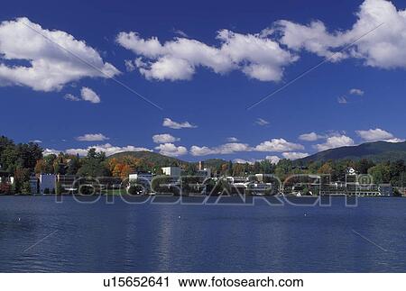 Lake Placid, NY, New York, The Adirondacks, Scenic view of the resort town of Lake Placid along Mirror Lake in the autumn. View Large Photo Image Stock Image - Lake Placid, NY, New York, The Adirondacks, Scenic view of the resort town of Lake Placid along Mirror Lake in the autumn.. Fotosearch