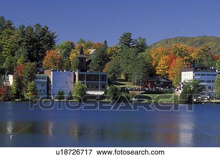 Lake Placid, NY, New York, The Adirondacks, Scenic view of the resort town of Lake Placid along Mirror Lake in the autumn. View Large Photo Image Stock Photo - Lake Placid, NY, New York, The Adirondacks, Scenic view of the resort town of Lake Placid along Mirror Lake in the autumn.. Fotosearch