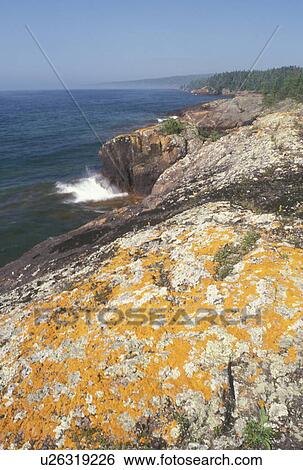 Stock Photograph -  Lake Superior, North Shore Drive, Grand Portage, MN, Minnesota, Scenic rocky shoreline along the north shore of Lake Superior in Grand Portage.. Fotosearch