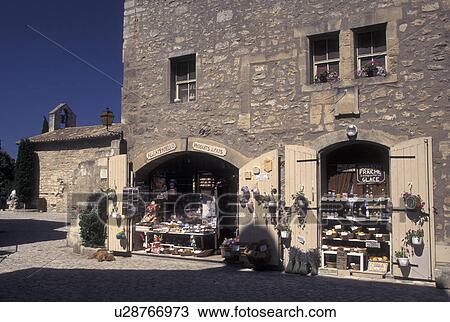 Les Baux de Provence, France, Bouche-du-Rhone, Provence, Europe, Shops along a narrow cobbled street in the medieval village of Les Baux de Provence. View Large Photo Image Stock Image - Les Baux de Provence, France, Bouche-du-Rhone, Provence, Europe, Shops along a narrow cobbled street in the medieval village of Les Baux de Provence.. Fotosearch