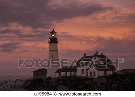 lighthouse, Cape Elizabeth, ME, Maine, Portland Headlight along the rocky coastline of the Atlantic Ocean at sunset. View Large Photo Image Stock Photo - lighthouse, Cape Elizabeth, ME, Maine, Portland Headlight along the rocky coastline of the Atlantic Ocean at sunset.. Fotosearch