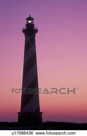 lighthouse, Cape Hatteras National Seashore, Outer Banks, North Carolina, NC, Cape Hatteras Lighthouse at sunrise on Cape Hatteras Nat'l Seashore on the Outer Banks. View Large Photo Image Stock Photograph - lighthouse, Cape Hatteras National Seashore, Outer Banks, North Carolina, NC, Cape Hatteras Lighthouse at sunrise on Cape Hatteras Nat'l Seashore on the Outer Banks.. Fotosearch